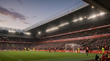 Anfield stadion, hjemmet til Liverpool FC, med et fullsatt publikum og en fotballkamp i gang.