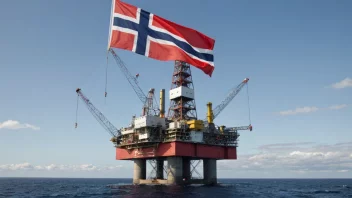 En offshore oljeplattform med et norsk flagg som vifter i vinden, symboliserer Norges offshoreindustri.