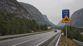 Et bilde av en bomvei i Norge med et skilt som viser bomavgiften.