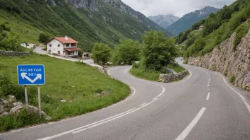 En pittoresk utsikt over en fjellby med en svingete atkomstveg.