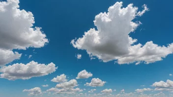 En lys og klar dag med en blå himmel og noen hvite skyer.