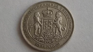 En femkronemynt fra Norge, med en intrikat design og valøren 5 kroner.