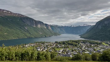 Et malerisk landskap av Ulvik, som viser kommunens naturskjønnhet og landbruksproduksjon.