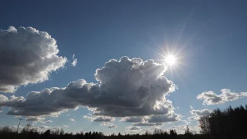 En solrik dag med noen skyer på himmelen.