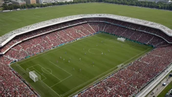 En fotballkamp med to lag som spiller på en grønn bane med et stadion i bakgrunnen