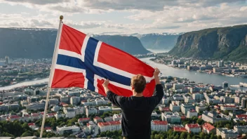 En person som holder det norske flagget og smiler, med en by eller landskap i bakgrunnen