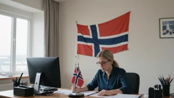 En person som arbeider ved et skrivebord med et norsk flagg i bakgrunnen, som representerer statsarbeid