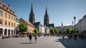 Et bilde av Trondheim by med Nidarosdomen i bakgrunnen og folk som går i gatene.