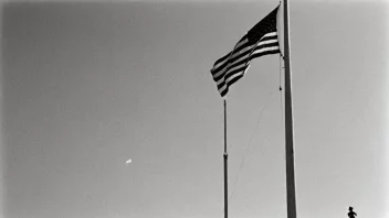 Et flagg som flyr på halv stang, symboliserer sorg og respekt.