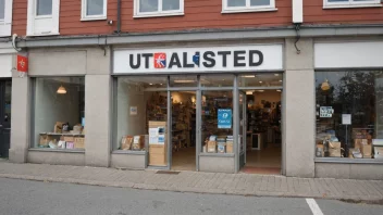 Et bilde av en butikk eller et salgspunkt med en skilt som sier 'utsalgssted' på norsk.