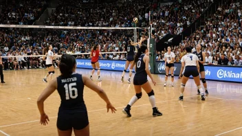 En spennende volleyballmatch med spillere i luften, som spiker og blokkerer ballen.