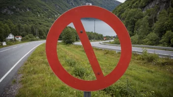 Et norsk veiskilt med en rød sirkel og en linje gjennom, som indikerer en forbudt handling eller aktivitet.