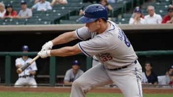 En baseballspiller i aksjon, som svinger en bat med en kraftig bevegelse.