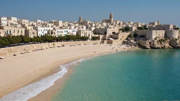 Et malerisk landskap av Puglia, Italia, med en strand, en historisk by og en klar blå himmel.